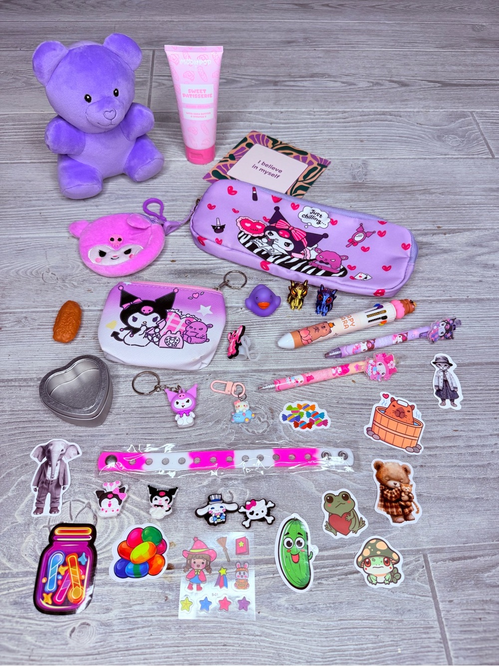 Plush bear Sanrio purse bundle keychain , pens , stickers croc charms , lotion
